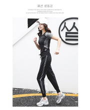 Load image into Gallery viewer, New Women Yoga Set Tracksuits Sport Suit Female Running Tights T-Shirt+Bra+Pants Quick Dry Comfortable Outdoor Fitness Black Gym